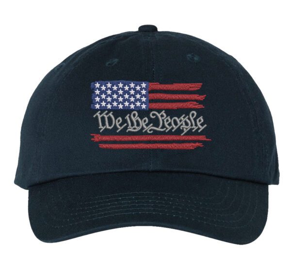 Baseball Cap with Embroidered American Flag and We The People across it.