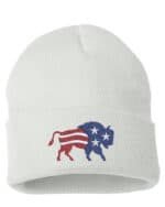 White cuffed beanie featuring an embroidered design of a bison with an American flag pattern in red, white, and blue.