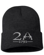 Black knitted beanie with "2A" and "1791" embroidered design featuring rifles, shown on the product page for gun rights apparel.