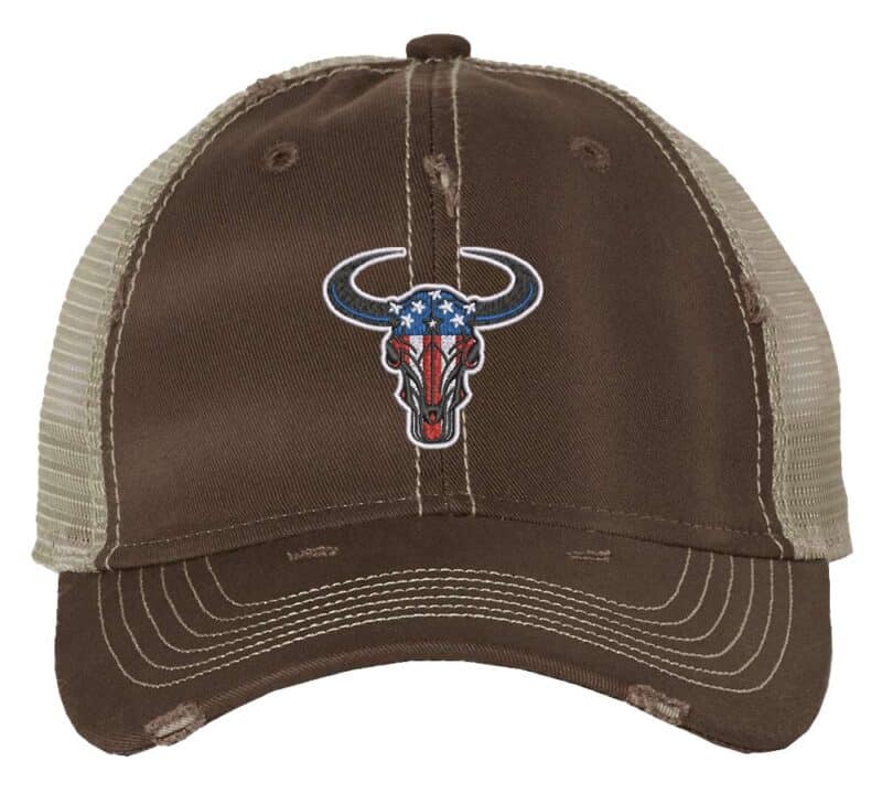 Distressed trucker hat with embroidered bull's head in vibrant American flag colors, adding a bold and patriotic touch to your look.