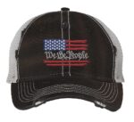 We The People trucker hat with distressed American flag embroidery featuring constitutional preamble text and breathable mesh back