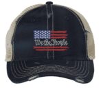 Distressed trucker hat with embroidered American flag and "We The People," ideal for showcasing patriotic pride in style.