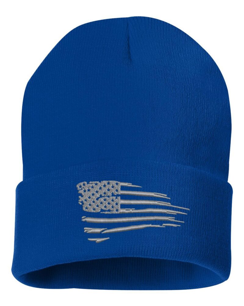 Blue beanie with a silver distressed American flag design on the front, displayed as a patriotic gift option.