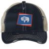 Distressed Wyoming trucker hat with embroidered state flag design, mesh back, and adjustable strapback closure.