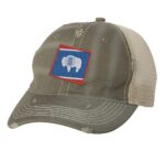 Distressed Wyoming trucker hat with embroidered state flag design, mesh back, and adjustable strapback closure.
