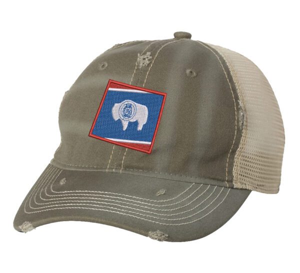 Distressed Wyoming trucker hat with embroidered state flag design, mesh back, and adjustable strapback closure.