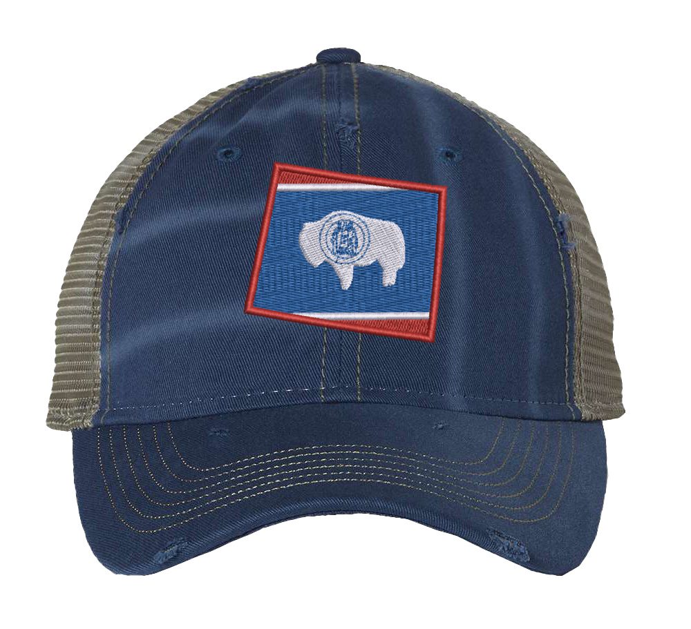 Distressed Wyoming trucker hat with embroidered state flag design, mesh back, and adjustable strapback closure.