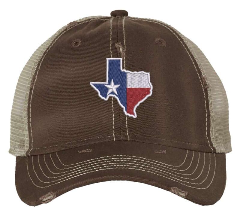 Distressed Texas trucker hat with embroidered state flag design, mesh back, and adjustable strapback closure.