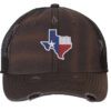 Distressed Texas trucker hat with embroidered state flag design, mesh back, and adjustable strapback closure.