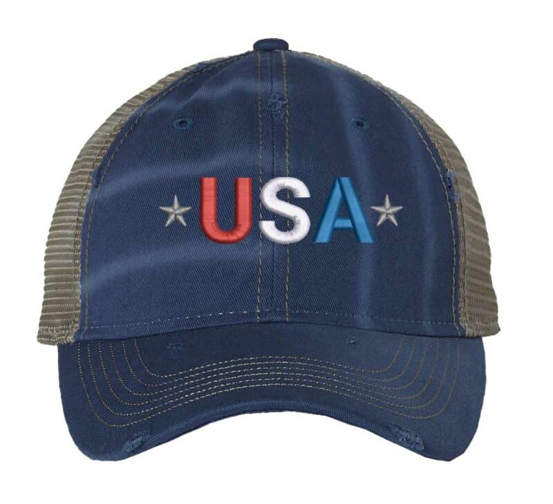 USA trucker cap with distressed finish, embroidered USA lettering in red, white, and blue colors, mesh back and adjustable strapback closure