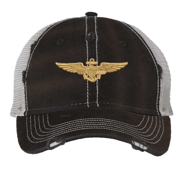 Distressed Navy Aviator Trucker Hat with gold embroidered pilot wings, rugged distressed finish, and breathable mesh back, adjustable strapback cap
