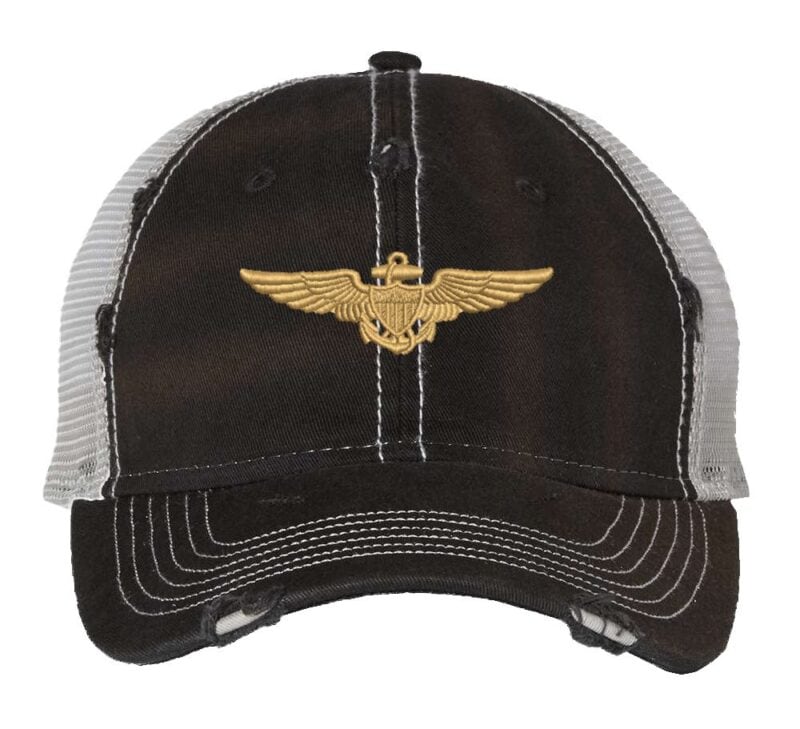 Aviation trucker hat with distressed navy finish, gold embroidered pilot wings, mesh back and adjustable strapback closure