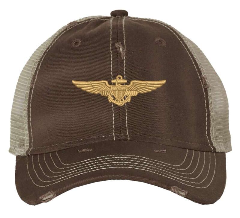 Distressed Navy Aviator Trucker Hat with gold embroidered pilot wings, rugged distressed finish, and breathable mesh back, adjustable strapback cap