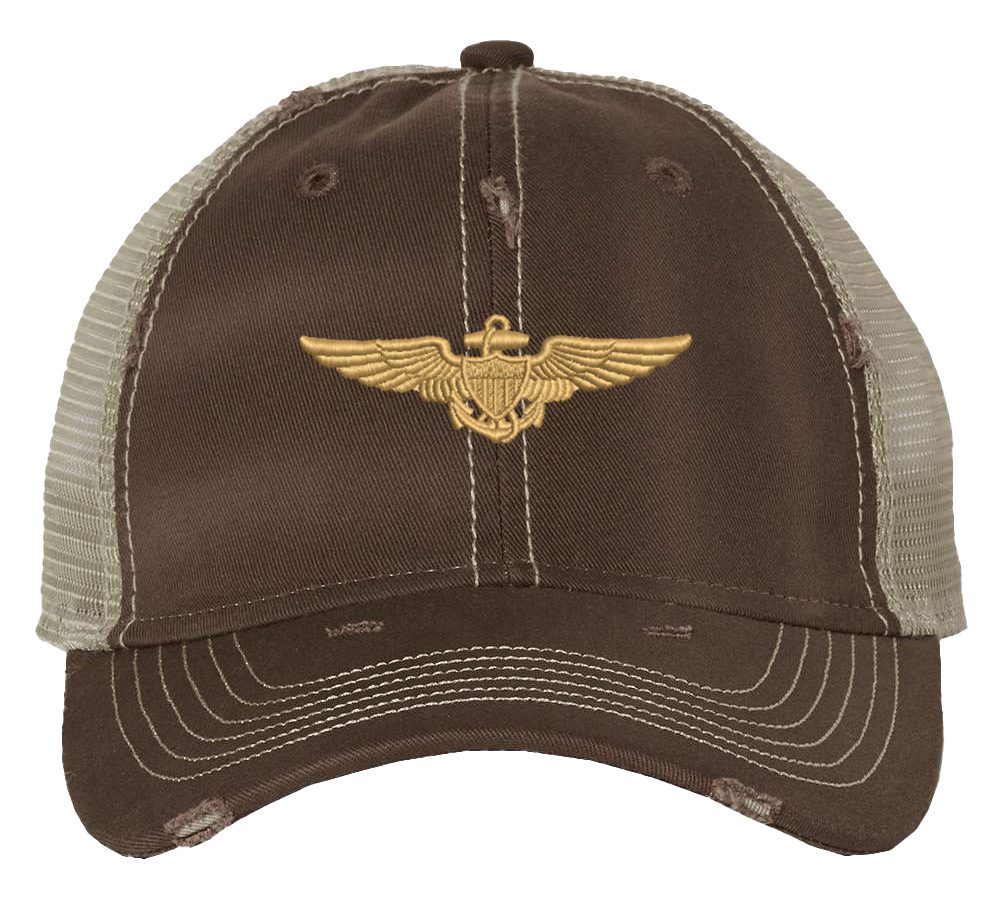 Distressed Navy Aviator Trucker Hat with gold embroidered pilot wings, rugged distressed finish, and breathable mesh back, adjustable strapback cap
