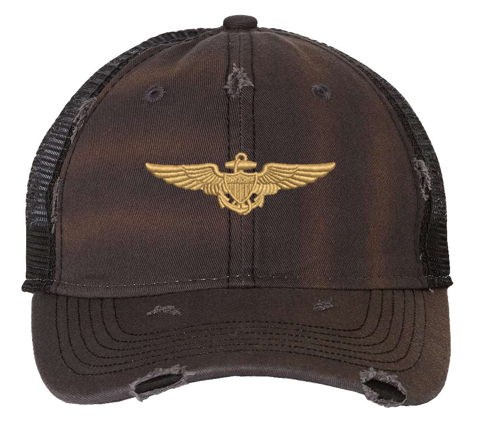 Distressed Navy Aviator Trucker Hat with gold embroidered pilot wings, rugged distressed finish, and breathable mesh back, adjustable strapback cap