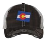 Distressed Colorado Trucker Hat with embroidered state flag, rugged distressed finish, and breathable mesh back, adjustable strapback cap