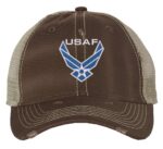 Distressed USAF trucker hat with embroidered blue and white Air Force logo, mesh back, and adjustable strapback.