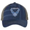 Distressed USAF trucker hat with embroidered blue and white Air Force logo, mesh back, and adjustable strapback.