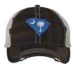 Distressed South Carolina trucker hat with embroidered state flag design, mesh back, and adjustable strapback closure.