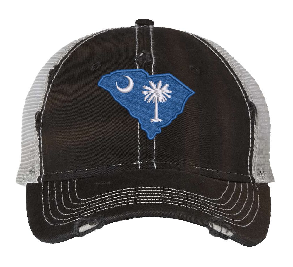 Distressed South Carolina trucker hat with embroidered state flag design, mesh back, and adjustable strapback closure.