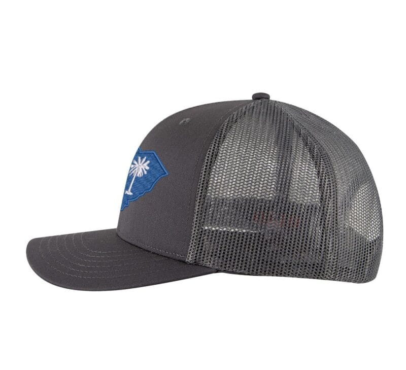 Classic South Carolina trucker hat with embroidered state flag in the shape of South Carolina, mesh back, and snapback closure.