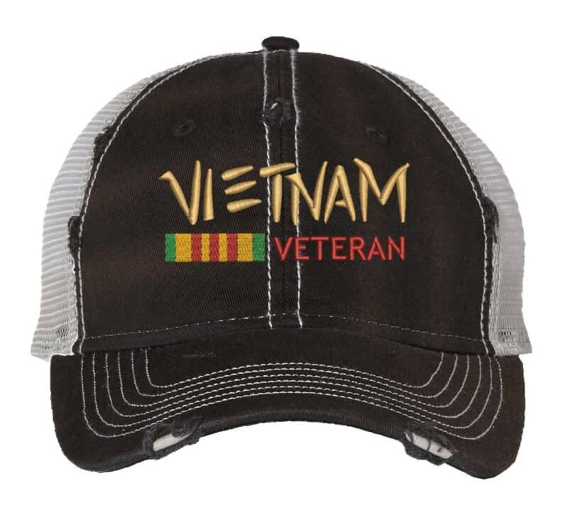 Distressed Vietnam Veteran trucker hat with embroidered military design, strapback mesh cap for veterans and military supporters.