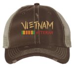 Distressed Vietnam Veteran trucker hat with embroidered military design, strapback mesh cap for veterans and military supporters.