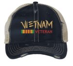 Distressed Vietnam Veteran trucker hat with embroidered military design, strapback mesh cap for veterans and military supporters.