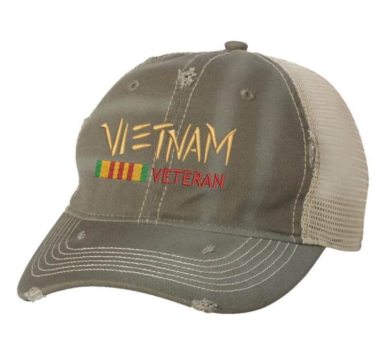 185DR-OLV-Olive-Khaki_Vietnam_Veteran_Distressed_Trucker_Hat Vietnam war hat with distressed finish, embroidered Vietnam Veteran design, mesh back and adjustable strapback closure