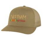 Vietnam Veteran trucker hat with embroidered design and snapback closure, mesh back cap for veterans and military supporters.