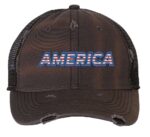 Distressed trucker hat with "AMERICA" embroidery in flag colors, mesh back panel, and adjustable strap closure