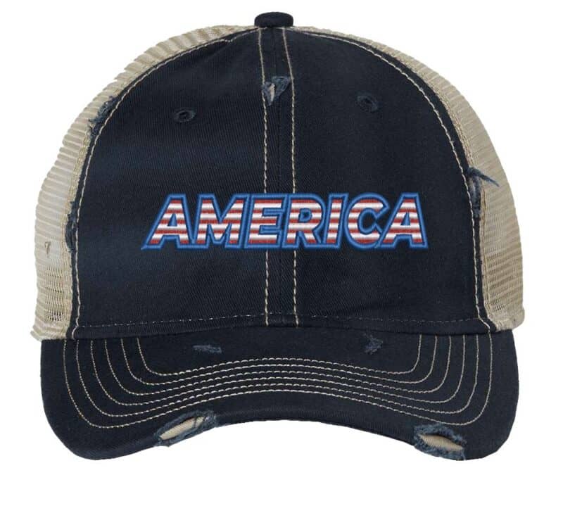 Distressed trucker hat with "AMERICA" embroidery in flag colors, mesh back panel, and adjustable strap closure