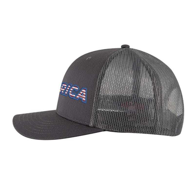 Classic trucker hat with "AMERICA" embroidery in flag colors, mesh back panel, and snapback closure