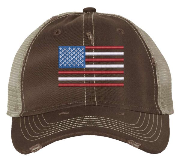Distressed trucker hat with embroidered American flag design, mesh back panel, and adjustable strap closure