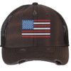 Distressed trucker hat with embroidered American flag design, mesh back panel, and adjustable strap closure