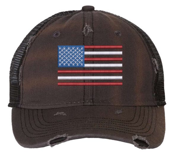 Distressed trucker hat with embroidered American flag design, mesh back panel, and adjustable strap closure