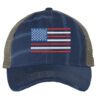 Distressed trucker hat with embroidered American flag design, mesh back panel, and adjustable strap closure