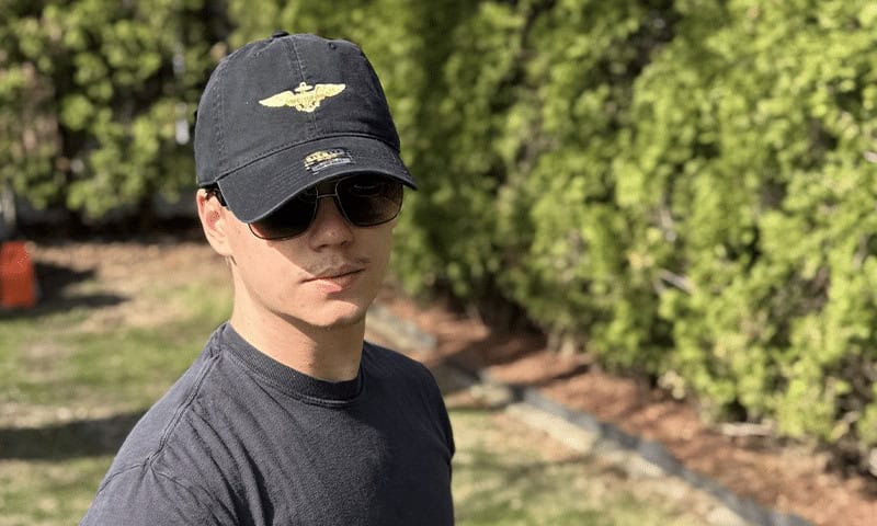 Patriot waring pilot wings hat