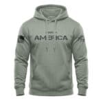 Patriotic hoodie with "Made in America" print, featuring American flag accents, perfect for showcasi.