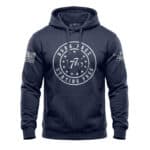 Patriotic navy hoodie with "Born Free Staying Free" design and American flag accents, perfect for ce.