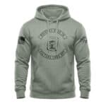 Distressed sage hoodie with whiskey-themed design and American flag accents.