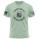 Distressed mint T-shirt with whiskey glass graphic and humorous text.