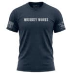 Navy Whiskey Works T-Shirt with distressed lettering and American flag on sleeve.