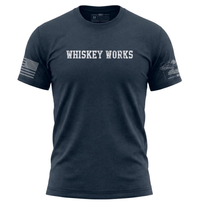 Navy Whiskey Works T-Shirt with distressed lettering and American flag on sleeve.