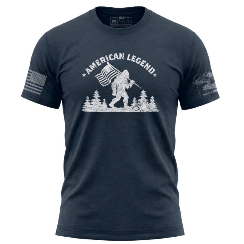Patriotic Bigfoot T-Shirt with American Flag and Forest Design in Navy.
