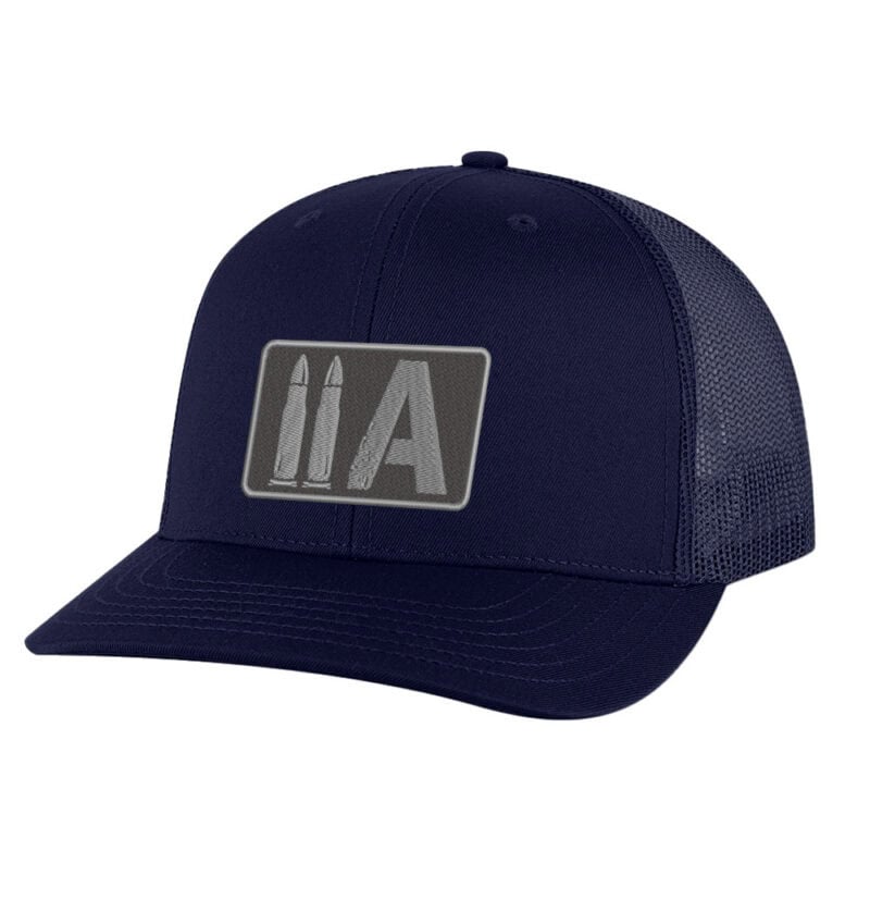 Navy blue trucker cap with America 2 Wear logo patch, breathable mesh back.