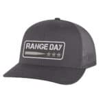 Black trucker hat with "Range Day" logo and stars, casual outdoor style.