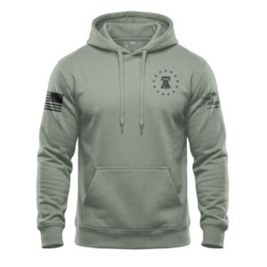 Hooded sweatshirt featuring American flag patch and star emblem, perfect for patriotic apparel enthu.