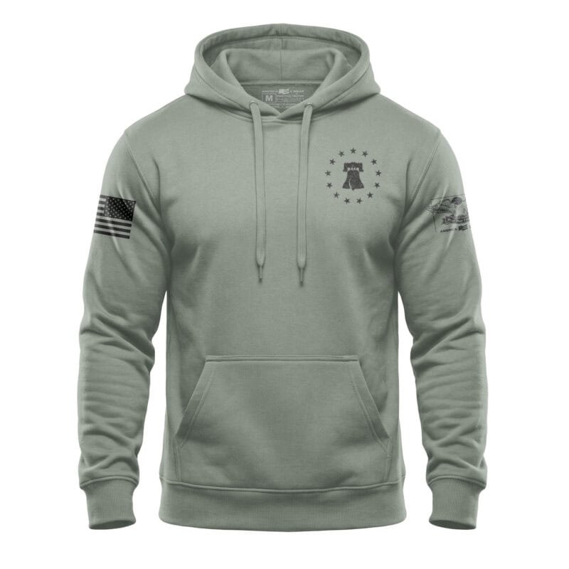 Hooded sweatshirt featuring American flag patch and star emblem, perfect for patriotic apparel enthu.