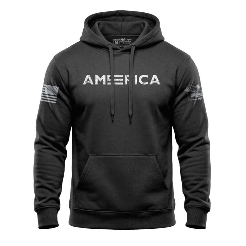 Black hoodie with "AMERICA" text and flag patches, casual American apparel.